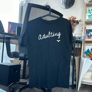 Black T-shirt; no tag